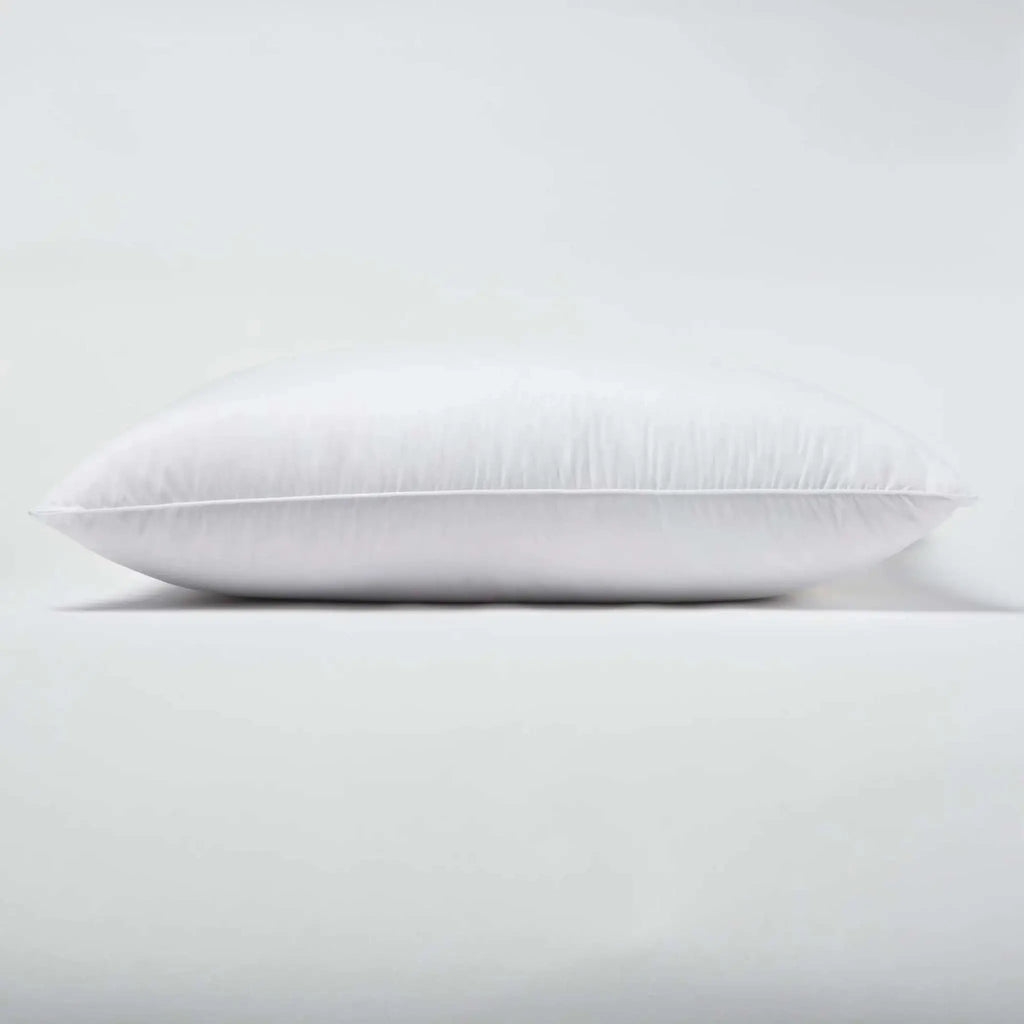 Premium down alternative pillow with medium fill, white cotton sateen cover, and elegant detailing.