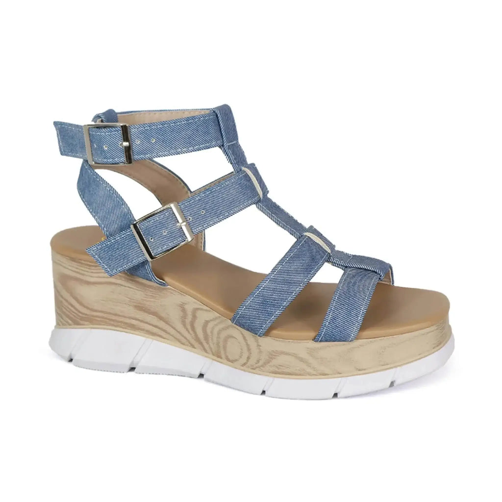 Women’s gladiator wedge beach sandals with blue straps and a wood-textured wedge heel.