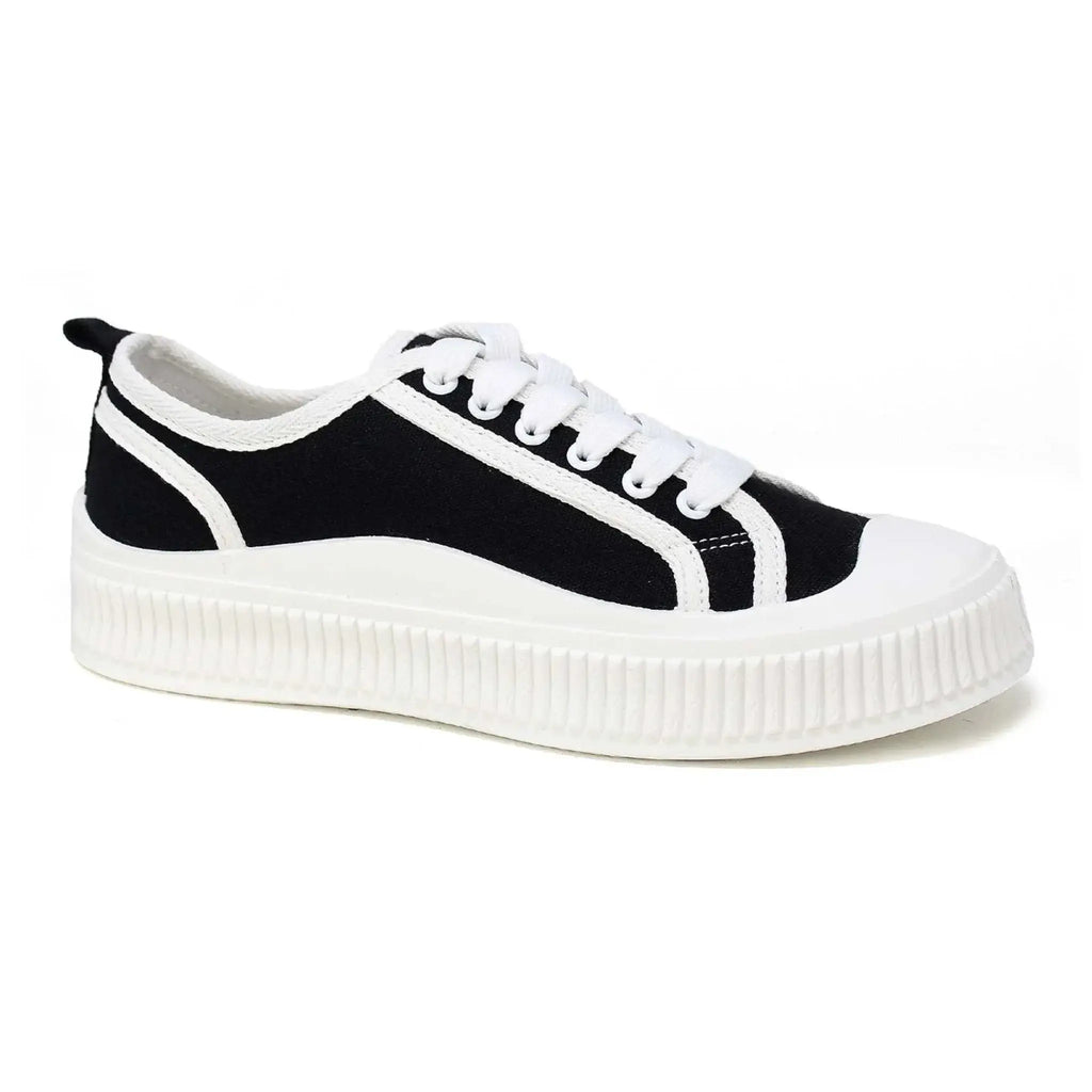 Women's black and white lace-up sneakers with a durable rubber sole.
