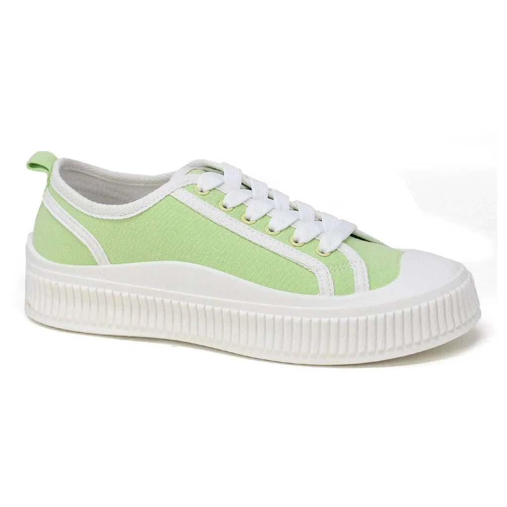 Women's lace-up sneakers in light green with white sole and breathable upper.