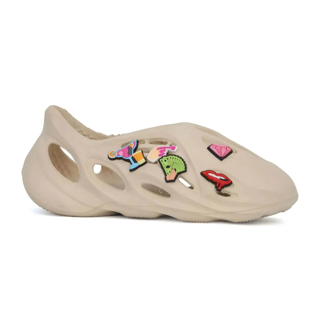 Yoki Women's EVA bubble sneakers with badges, trendy design, lightweight, customized detailing, slip-resistant sole.