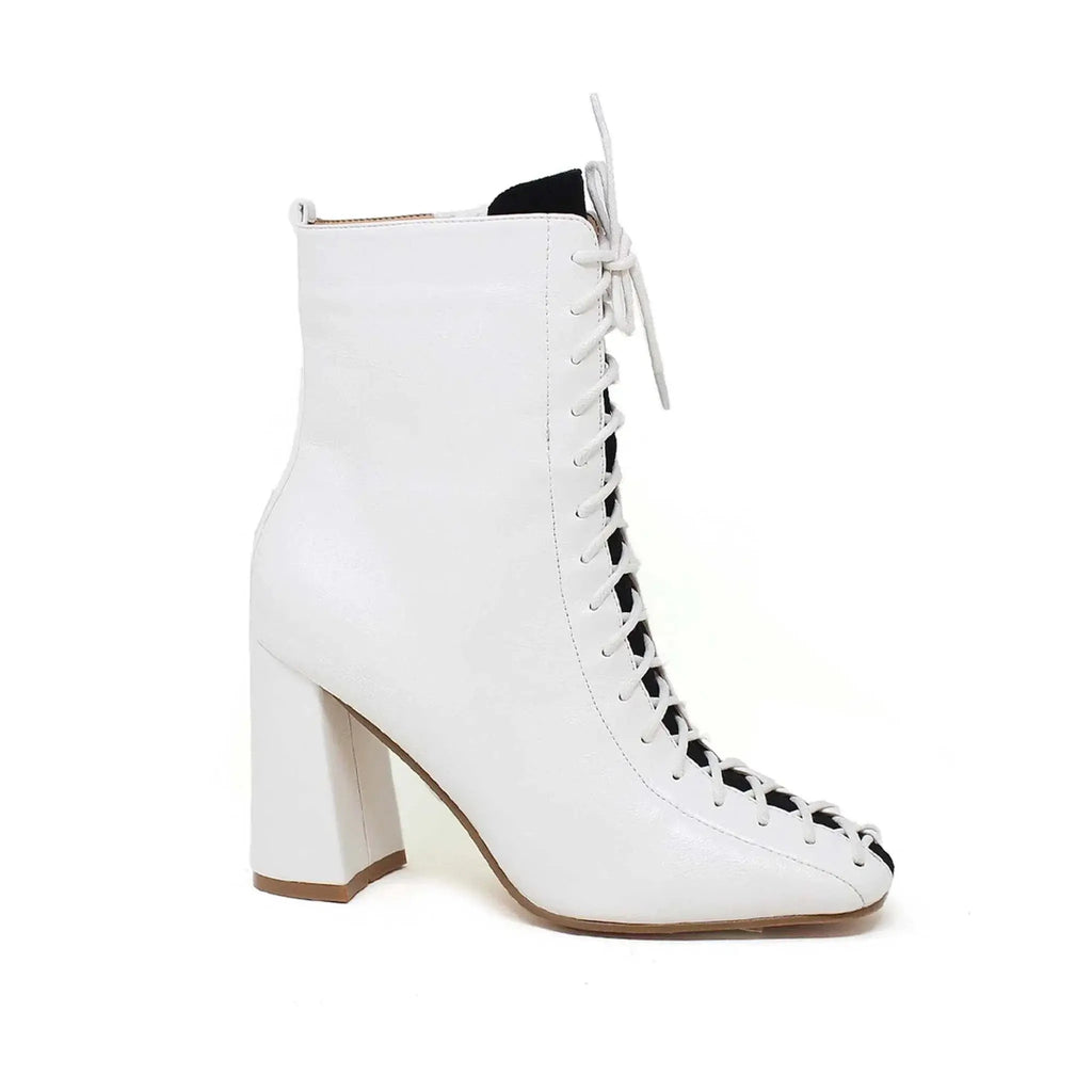 Yoki Women's Jacklyn-02 white lace-up heel bootie with premium PU upper, chic heel design, and slip-resistant sole.