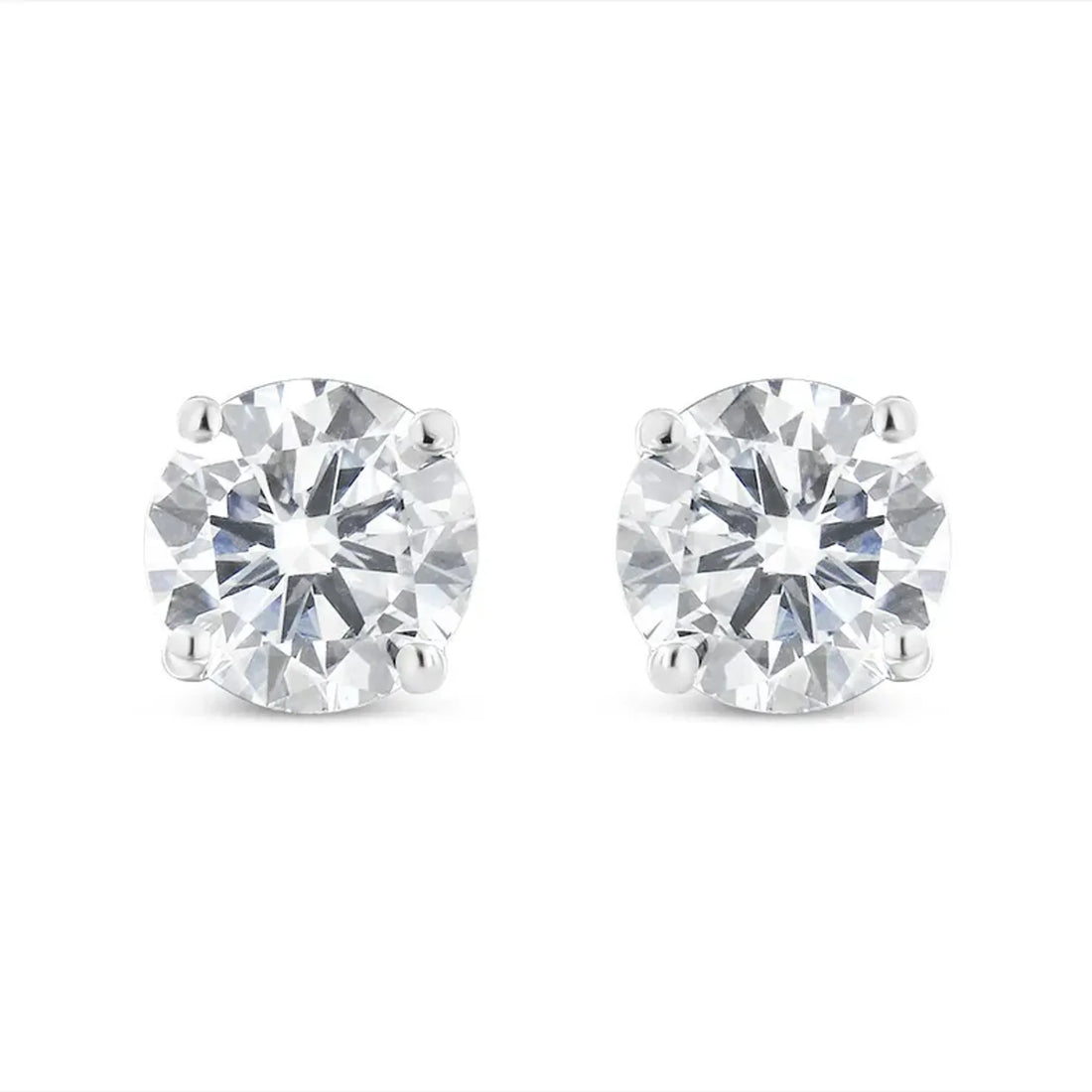 10K white gold diamond stud earrings with round brilliant-cut stones in four-prong settings.