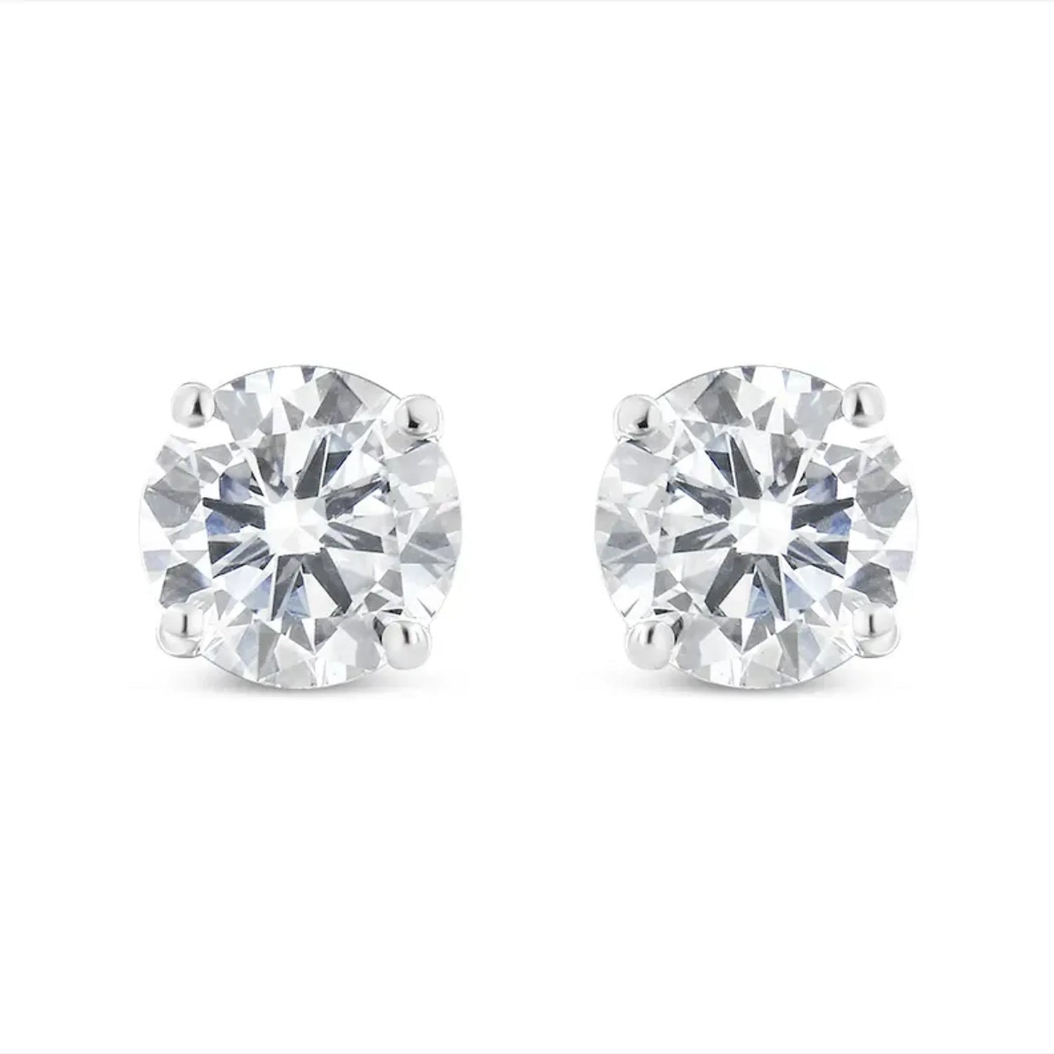 10K white gold diamond stud earrings with round brilliant-cut stones in four-prong settings.