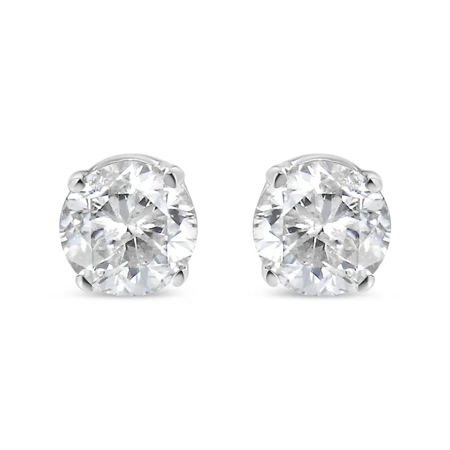 14K white gold diamond stud earrings with round brilliant-cut diamonds in a 4-prong setting.