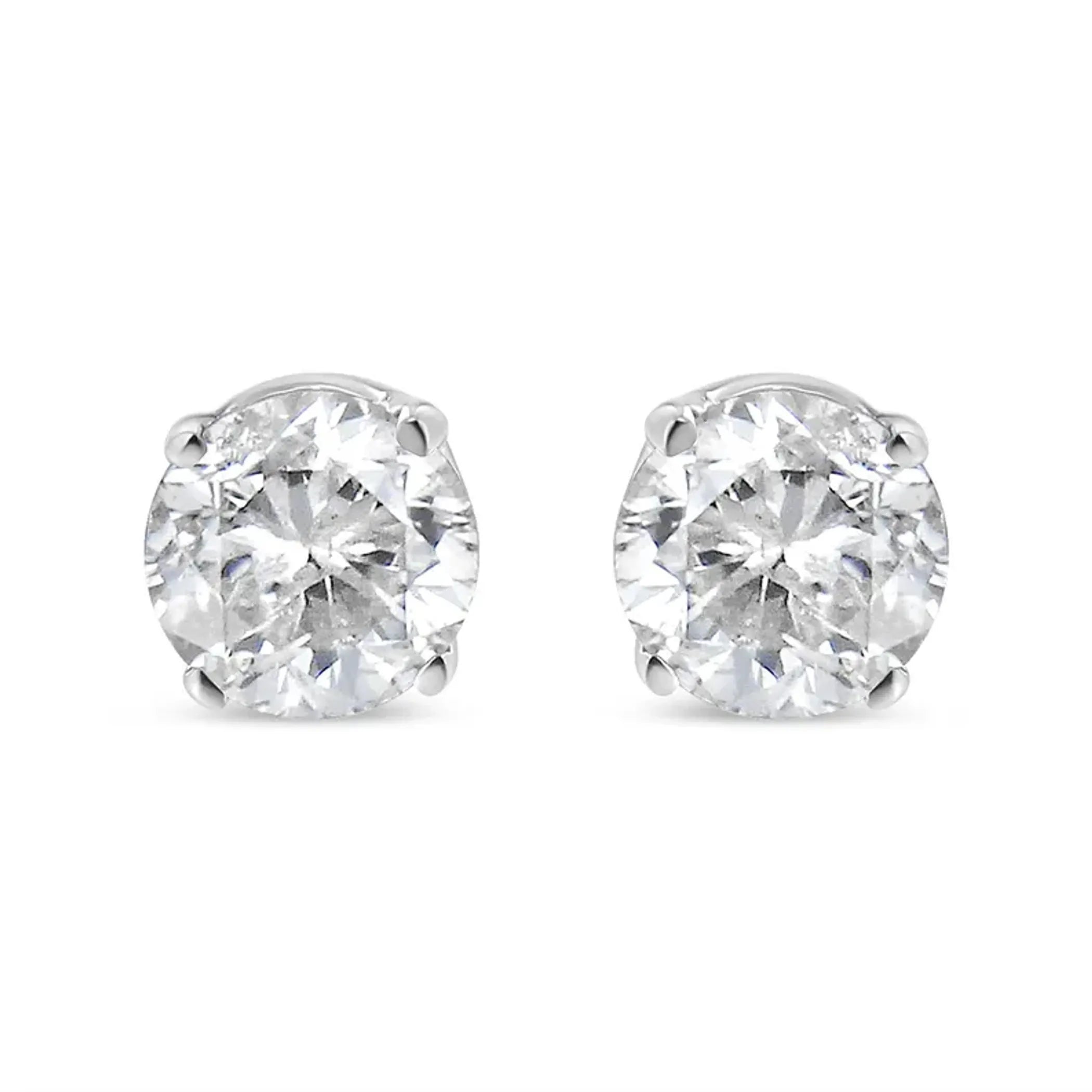 14K white gold diamond stud earrings with round brilliant-cut diamonds in a 4-prong setting.