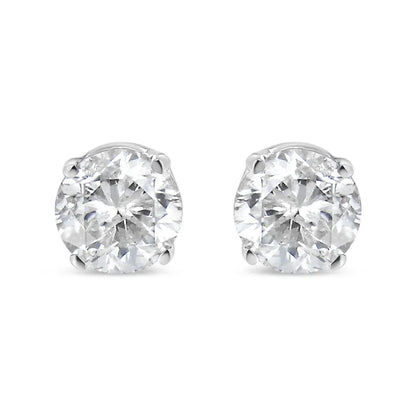 14K white gold diamond stud earrings with round brilliant-cut diamonds in a 4-prong setting.