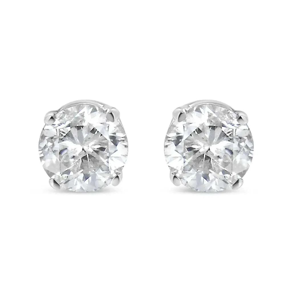 14K white gold diamond stud earrings with 3/4 CTTW round brilliant-cut near-colorless diamonds.