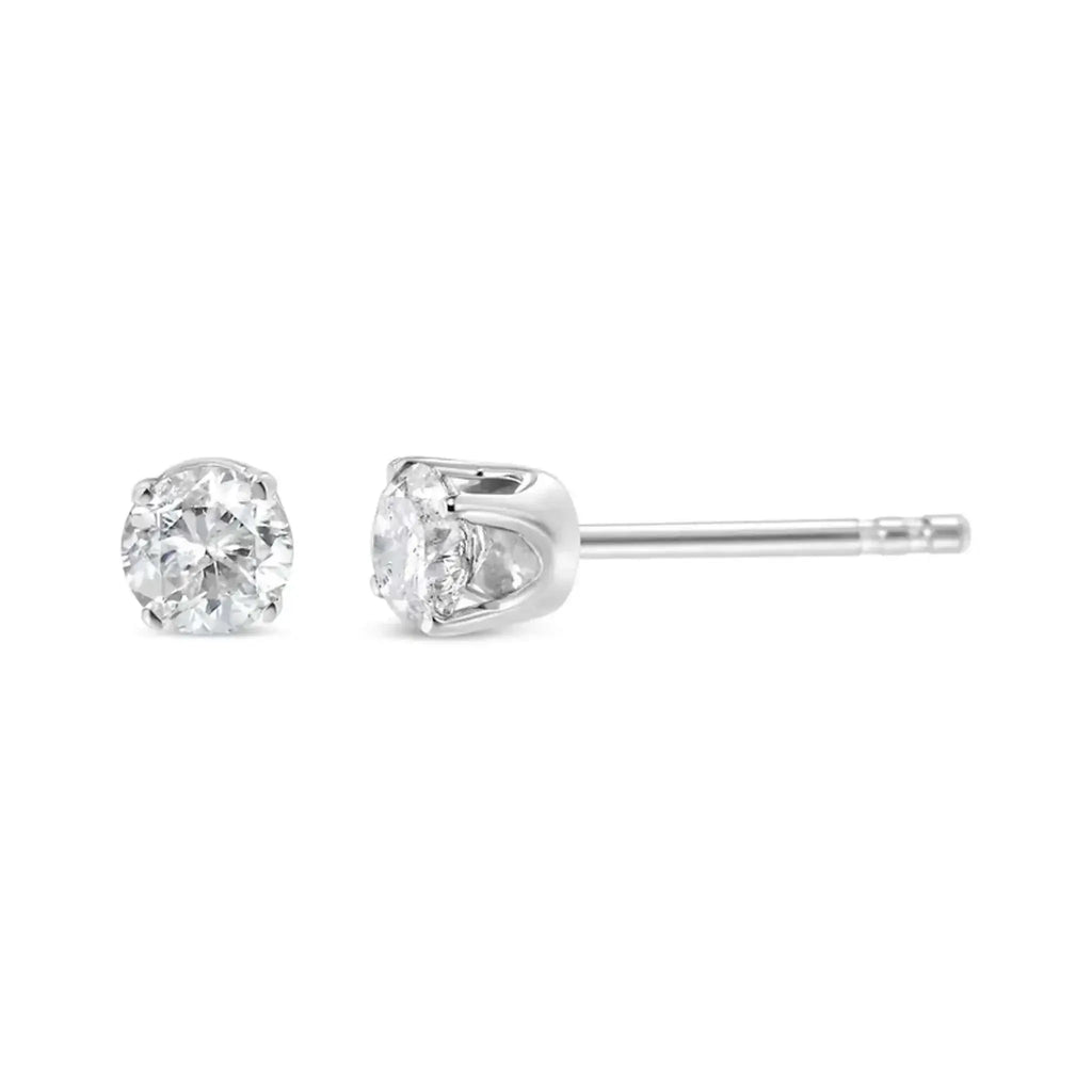 14K white gold diamond stud earrings with 3/4 CTTW round brilliant-cut near-colorless stones.