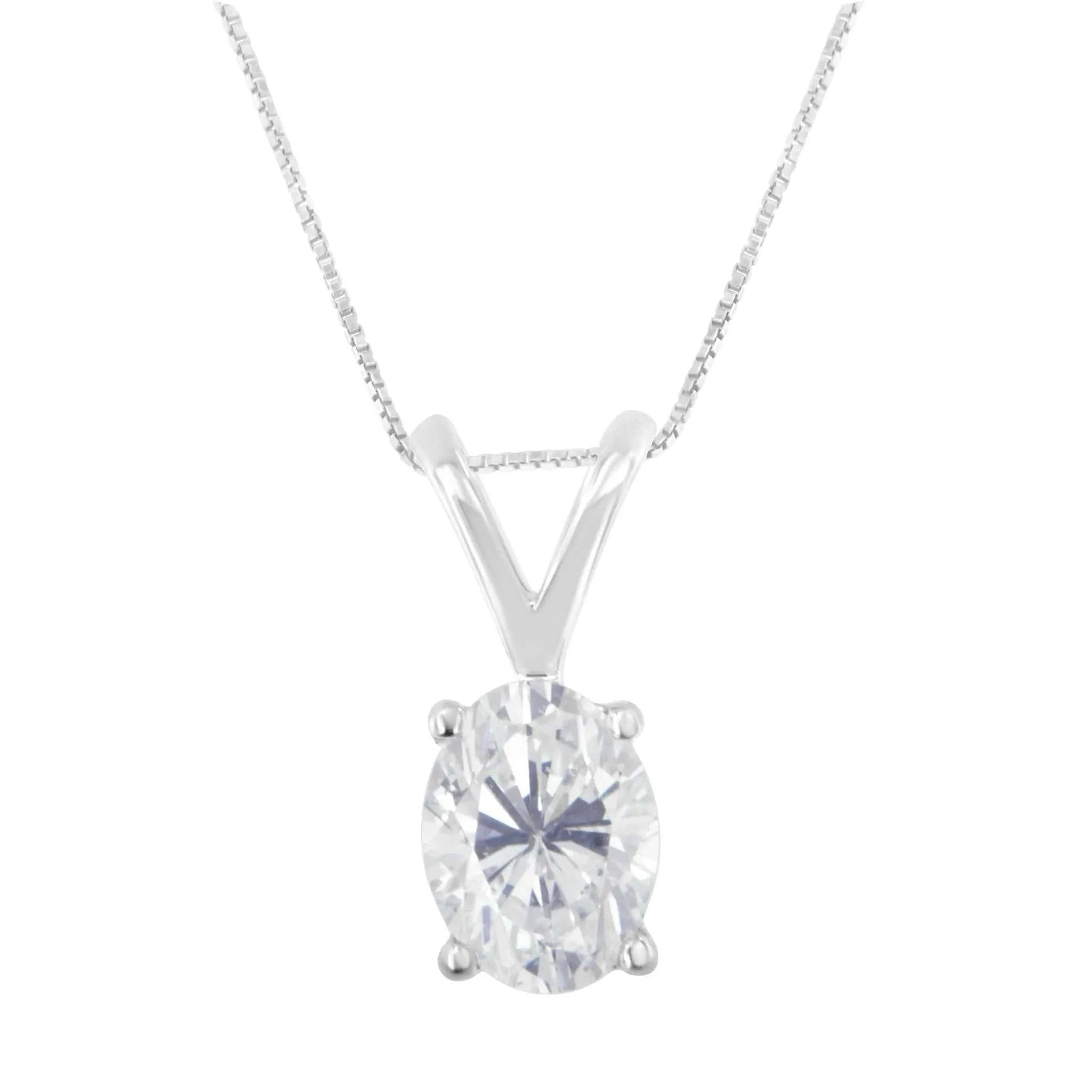 IGI Certified 10K white gold diamond oval pendant necklace, 18-inch chain.