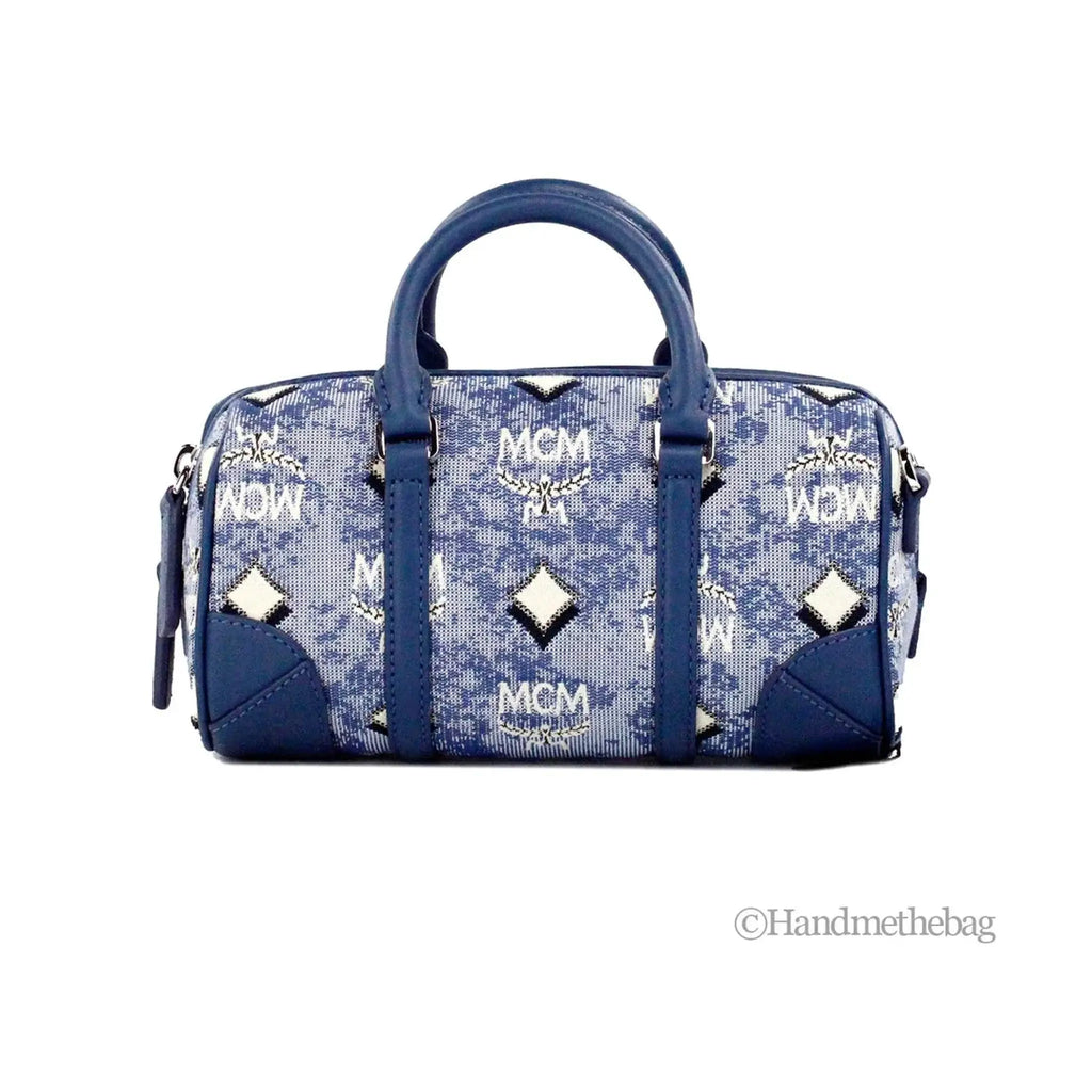 MCM Boston Mini Blue Vintage Jacquard Satchel Crossbody Bag with logo pattern, adjustable strap, and inner slip pocket.