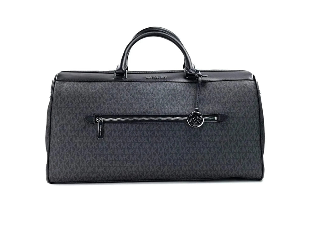 Michael Kors extra large black duffel bag with signature PVC, adjustable strap, and multiple pockets.