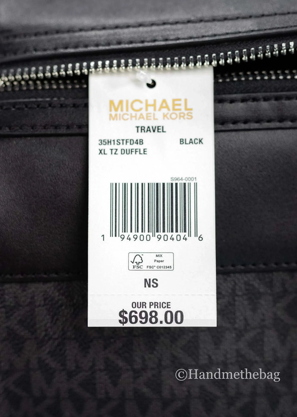 Michael Kors Travel Extra Large Black Duffel Bag with price tag and zipper detail.