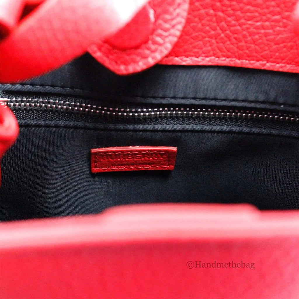 Red Burberry Lorne Small Branded Leather Bucket Crossbody Bag with inner zip pocket and adjustable strap.