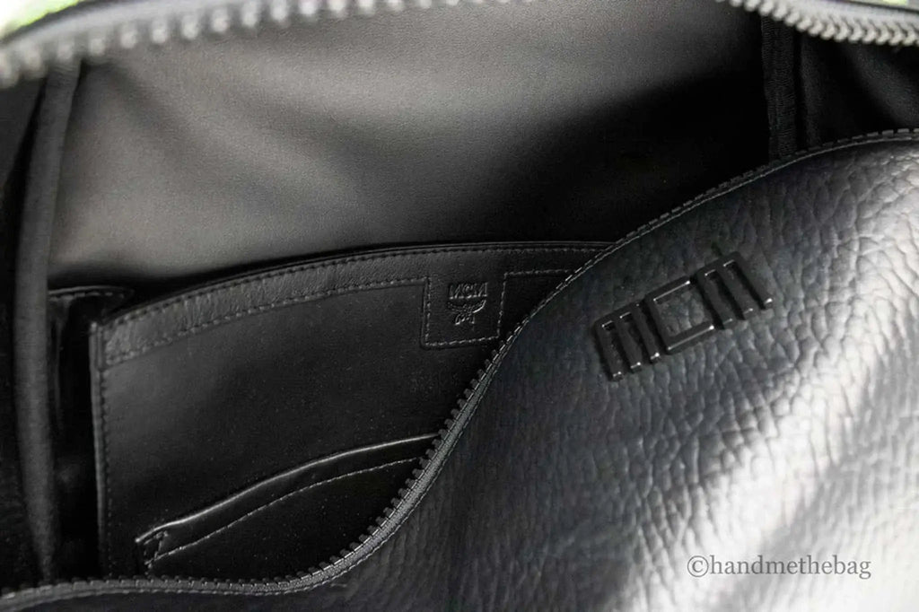 MCM Color Splash Visetos Medium Backpack interior with leather detailing and logo.