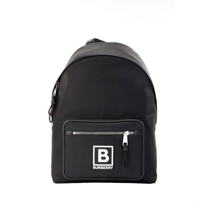 Burberry Abbeydale Backpack, black nylon, branded, with pockets and adjustable straps.