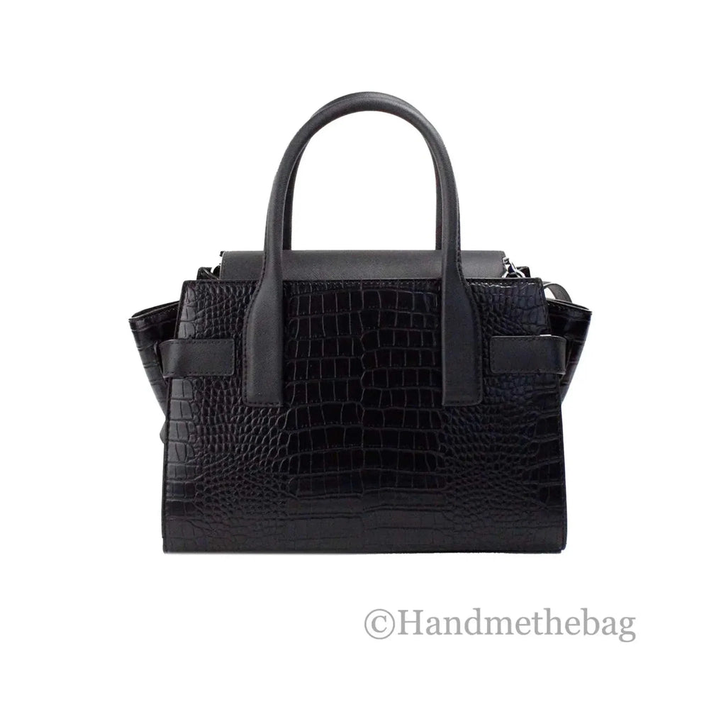 Michael Kors Carmen medium black embossed leather satchel with animal print, saffiano leather, adjustable crossbody strap, and magnetic flap closure.