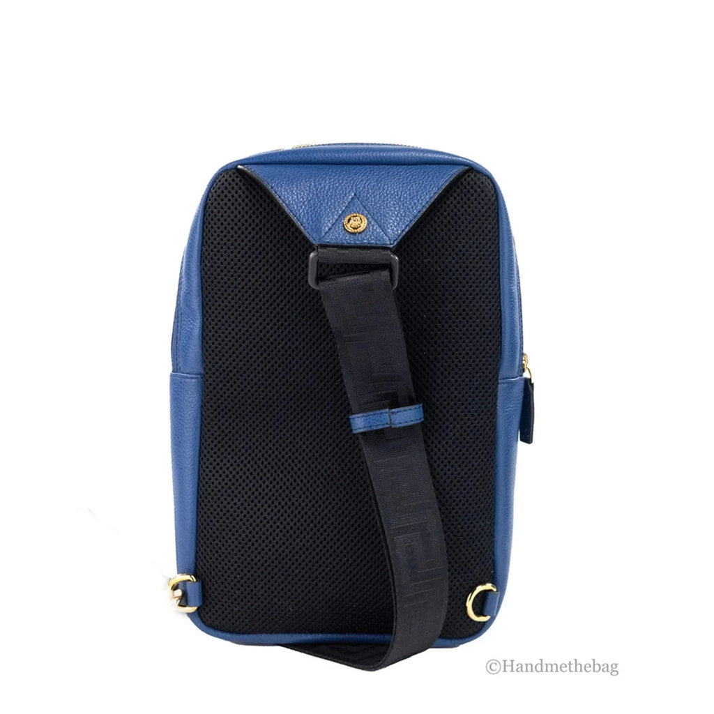 Versace Medusa navy leather sling pack backpack with adjustable strap.