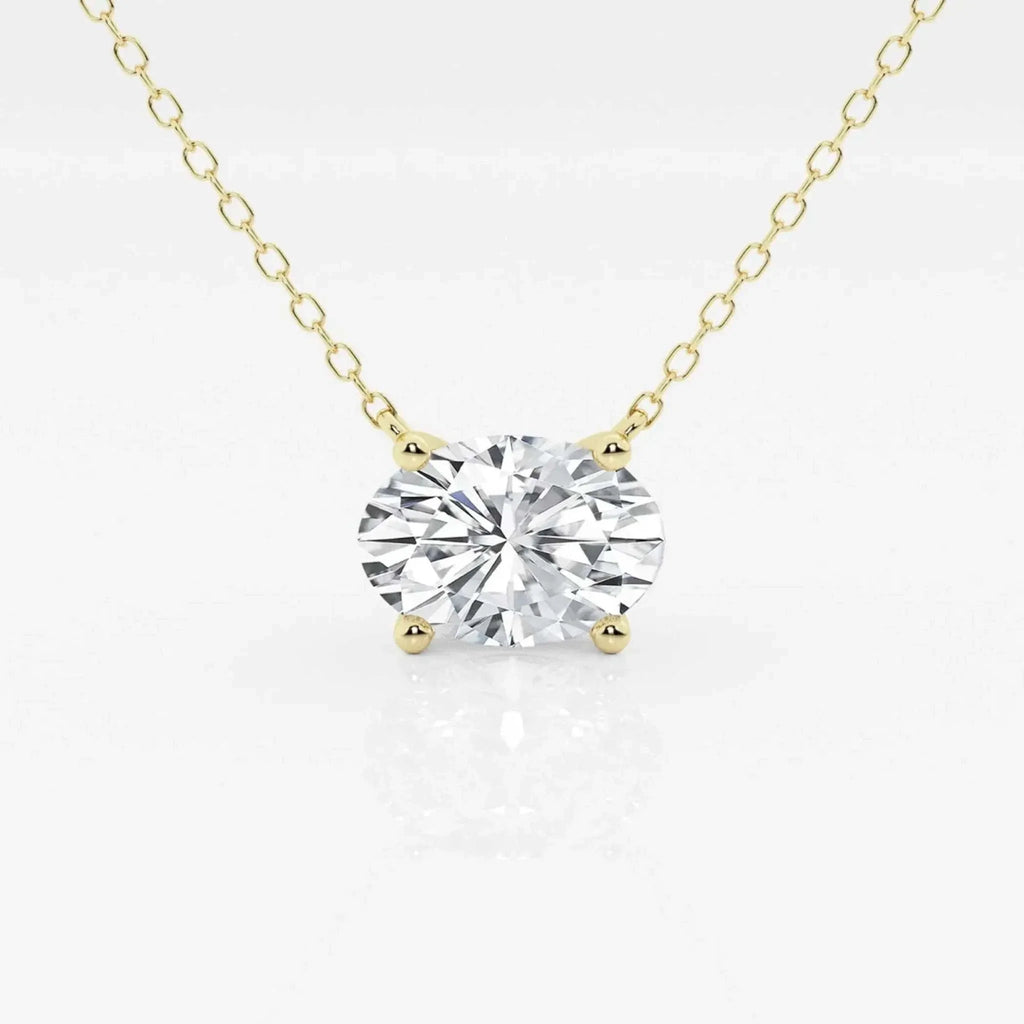 Oval lab-grown diamond solitaire pendant on 18-inch 14kt yellow gold chain.